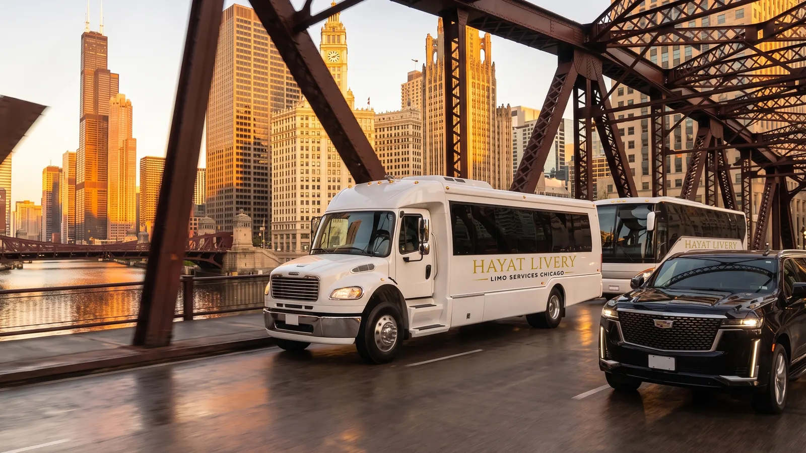 A Hayat Livery party bus, motor coach and black SUV cross a Chicago River bridge at sunrise